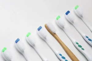 A variety of soft-bristled toothbrushes displayed to illustrate how to clean dental implants, recommended by Montana Center for Implants and Dentures.
