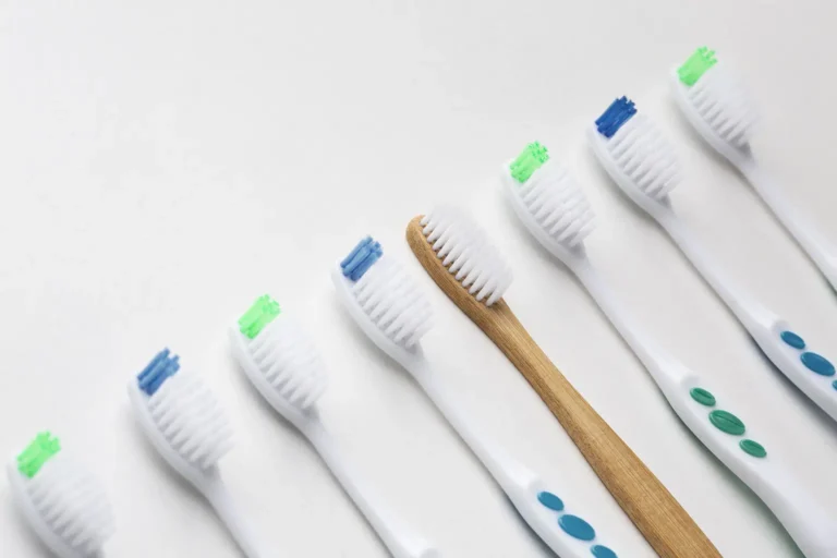 A variety of soft-bristled toothbrushes displayed to illustrate how to clean dental implants, recommended by Montana Center for Implants and Dentures.